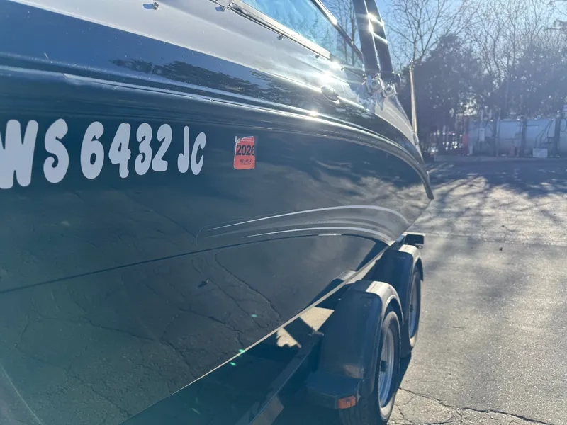 Slide: The Image of 2014 Yamaha SX210 boat on a trailer. - 19