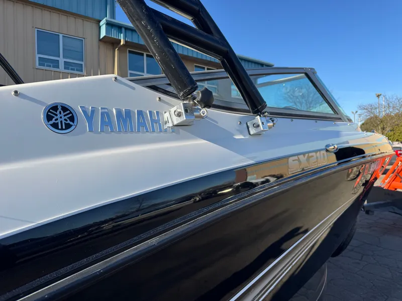 Slide: The Image of 2014 Yamaha SX210 boat, close-up of logo and design. - 3