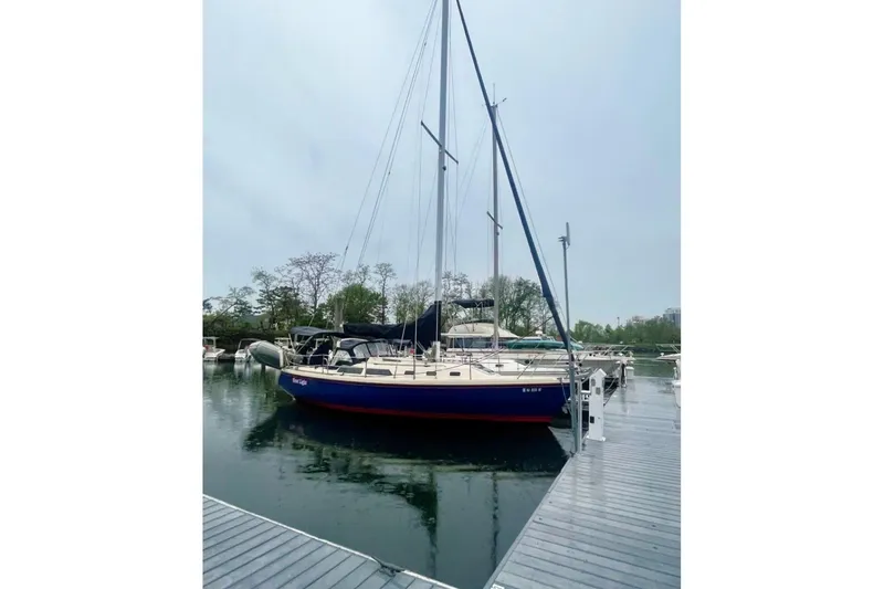 Slide: The Image of Sailboat docked at marina, 1992 Catalina 34 model, overcast sky. - 5