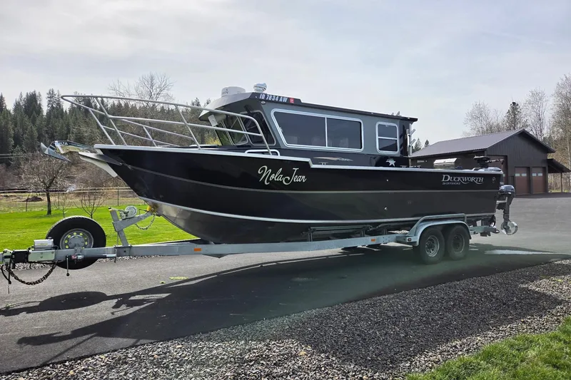 Slide: The Image of 2012 Duckworth 28 Offshore boat on trailer, parked outdoors. - 33