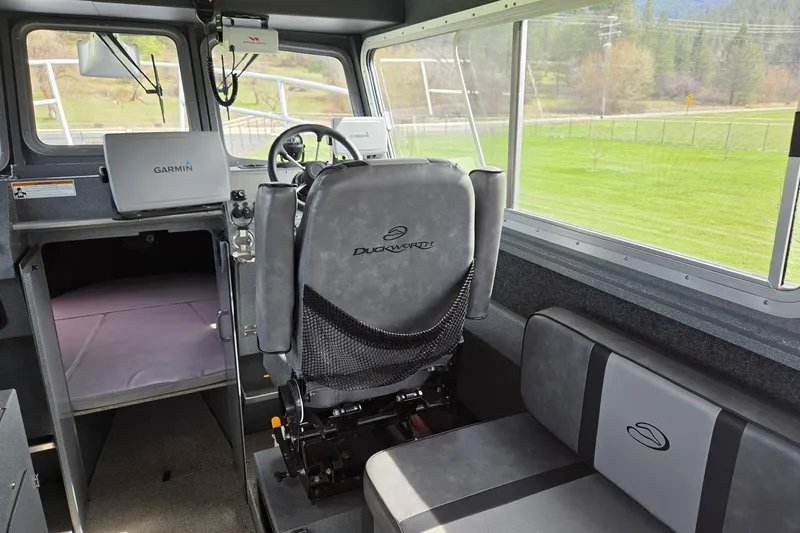 Slide: The Image of Interior of a 2012 Duckworth 28 Offshore boat with Garmin navigation system. - 6