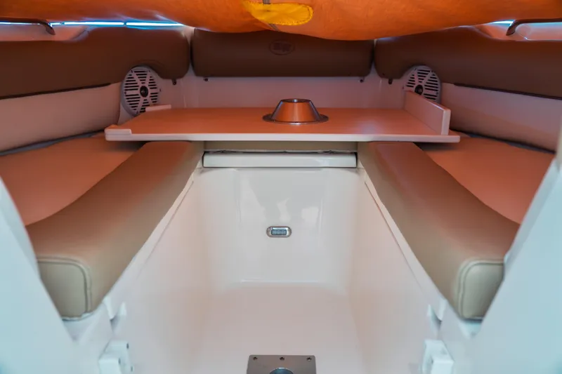 Slide: The Image of Interior of 2019 Key West 239 DFS boat with seating and table setup. - 14