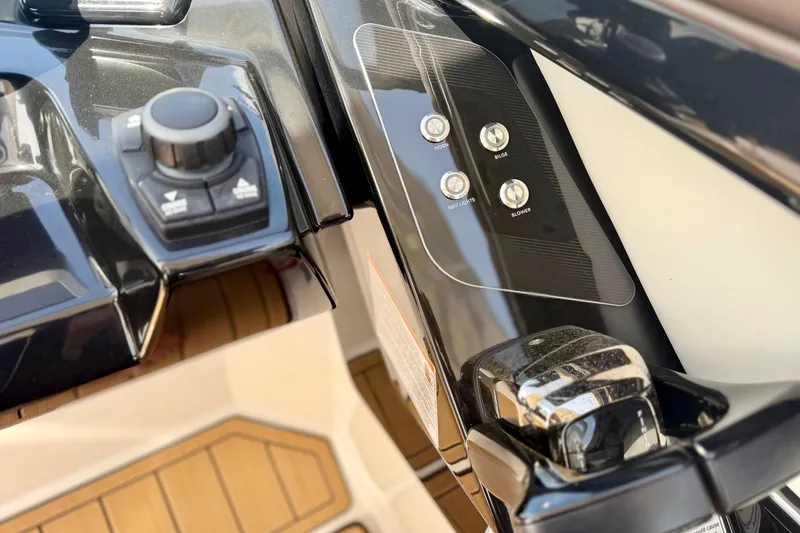 Slide: The Image of Control panel of 2022 Yamaha Boats 275SD, featuring navigation and function buttons. - 35