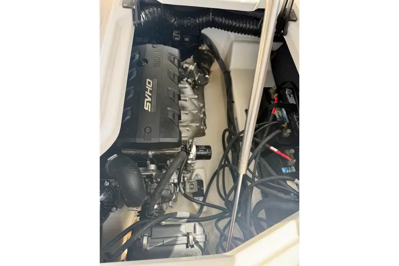 Slide: The Image of Engine compartment of 2022 Yamaha Boats 275SD, featuring SVHO engine and battery setup. - 37