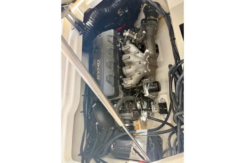 Slide: The Image of Engine compartment of 2022 Yamaha Boats 275SD, showcasing detailed mechanical components. - 38