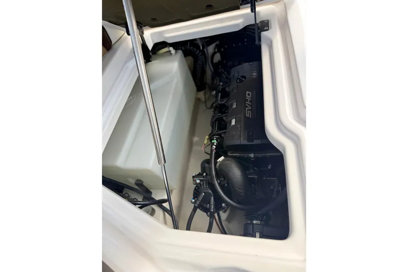 Slide: The Image of Engine compartment of 2022 Yamaha Boats 275SD, showcasing internal components and design. - 39