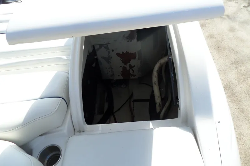 Slide: The Image of 2013 Rinker 296 Captiva Cuddy boat interior storage compartment. - 38