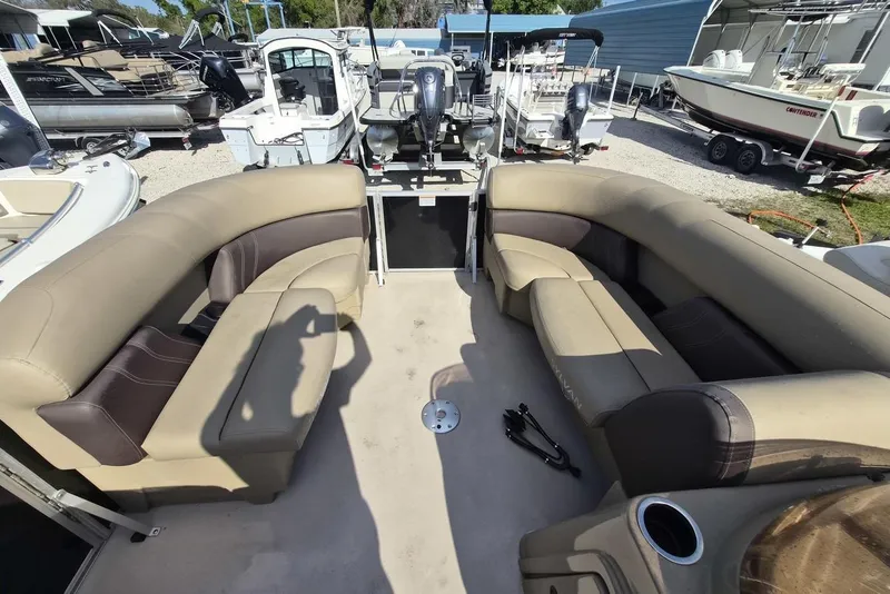 Slide: The Image of 2022 Sylvan Mirage Fish 820 Party Fish pontoon boat interior with beige seating. - 3