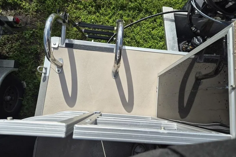 Slide: The Image of Rear view of 2022 Sylvan Mirage Fish 820 Party Fish boat ladder and platform. - 6
