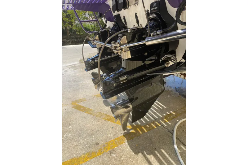 Slide: The Image of 1997 Powerplay Powerboats 33 Sport Deck engine and propeller detail. - 9