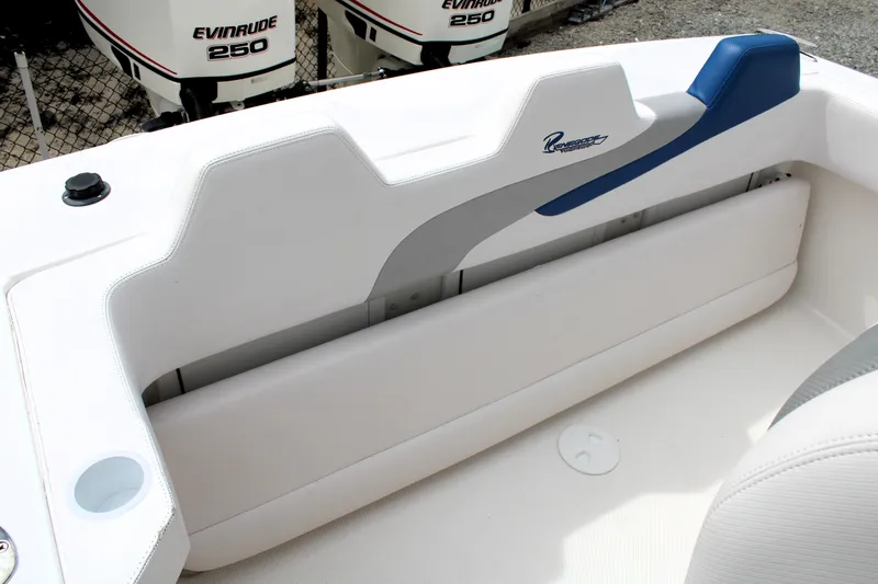 Slide: The Image of 2007 Renegade 29CC boat interior with white seating and Evinrude 250 engines. - 13