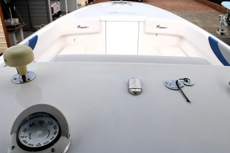 Slide: The Image of 2007 Renegade 29CC boat interior with gauge and controls, showcasing sleek design and functionality. - 28