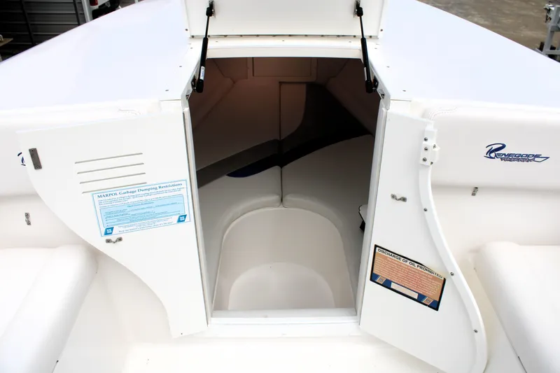 Slide: The Image of 2007 Renegade 29CC boat cabin entrance with open doors and visible interior. - 40