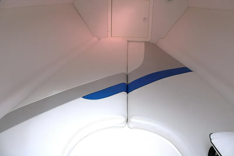Slide: The Image of Interior cabin of a 2007 Renegade 29CC boat with cushioned seating. - 41