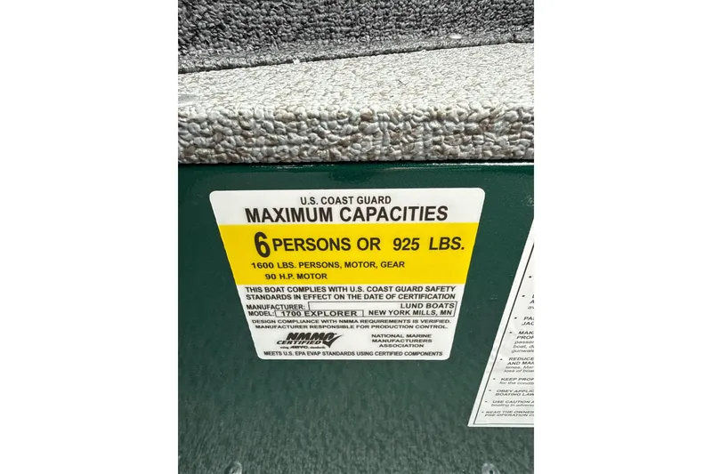 Slide: The Image of 2026 Lund 1700 Explorer Sport capacity label, 6 persons or 925 lbs, 90 HP motor. - 12