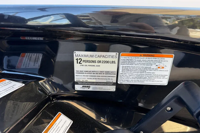 Slide: The Image of 2016 Yamaha Boats 242 Limited S capacity label, maximum 12 persons or 2200 lbs. - 12