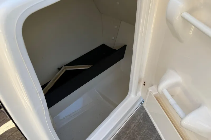Slide: The Image of Storage compartment inside a 2016 Yamaha Boats 242 Limited S. - 20