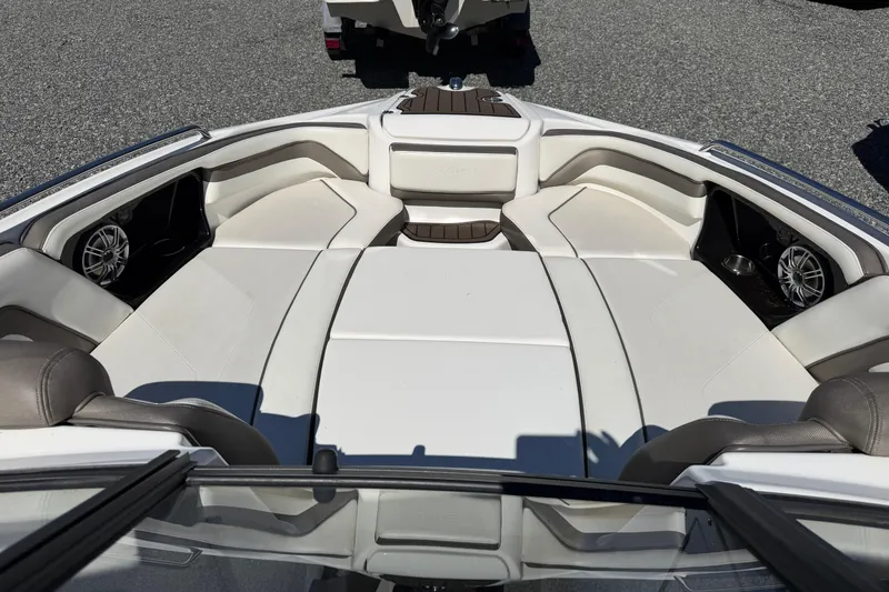 Slide: The Image of 2016 Yamaha Boats 242 Limited S interior with spacious seating and sleek design. - 6