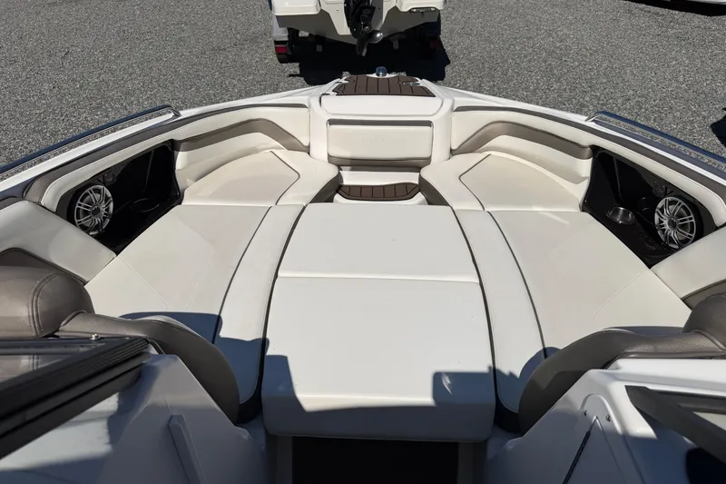 Slide: The Image of 2016 Yamaha Boats 242 Limited S interior with spacious seating and sleek design. - 8