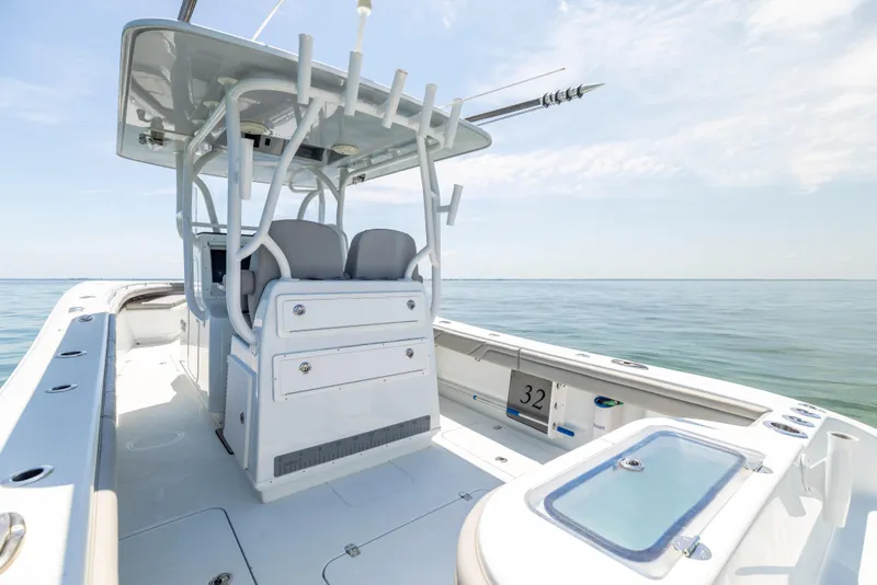 Slide: The Image of 2018 Yellowfin 32 Offshore boat on calm sea. - 16