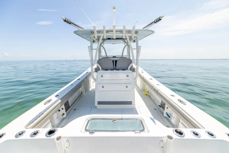 Slide: The Image of 2018 Yellowfin 32 Offshore boat on calm sea. - 17