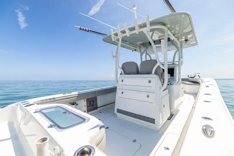 Slide: The Image of 2018 Yellowfin 32 Offshore boat on open sea. - 18