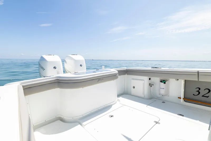 Slide: The Image of 2018 Yellowfin 32 Offshore boat on open sea. - 25