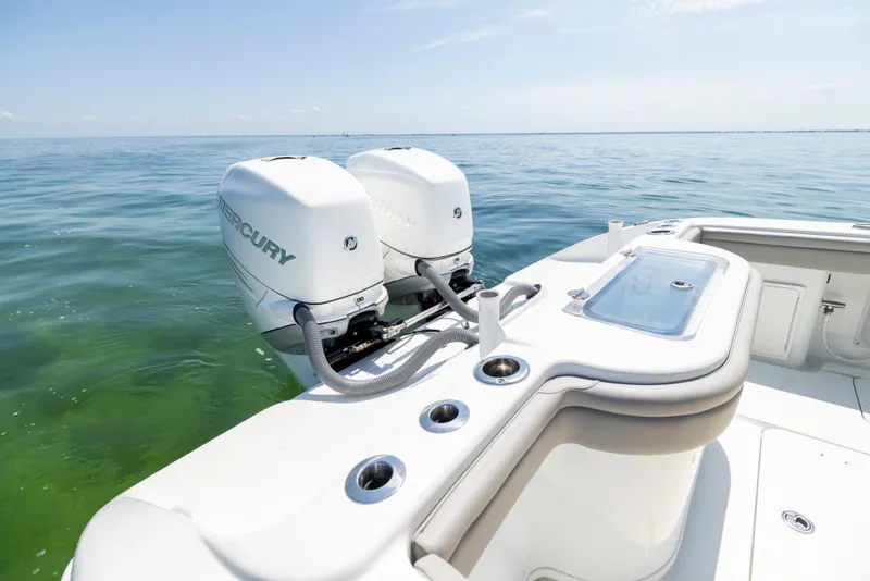 Slide: The Image of 2018 Yellowfin 32 Offshore with dual engines on open sea. - 26