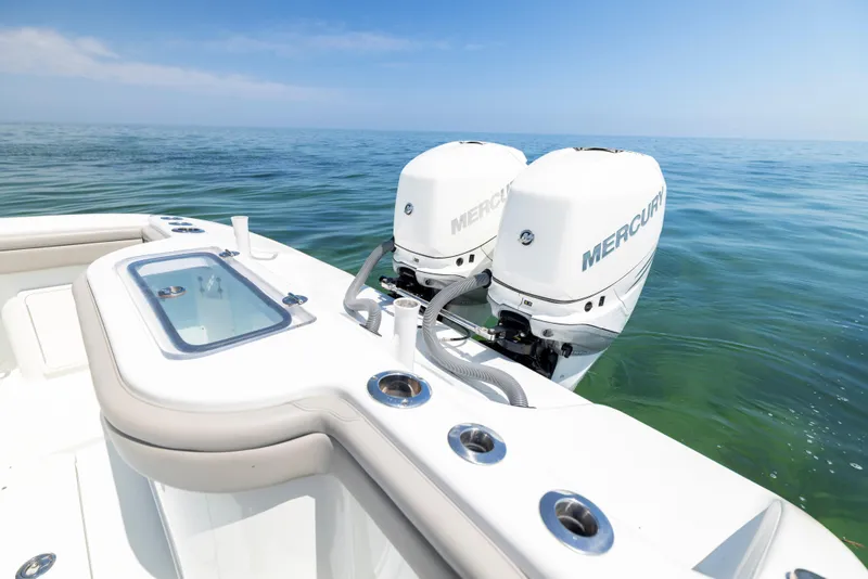 Slide: The Image of 2018 Yellowfin 32 Offshore with Mercury engines on open sea. - 27