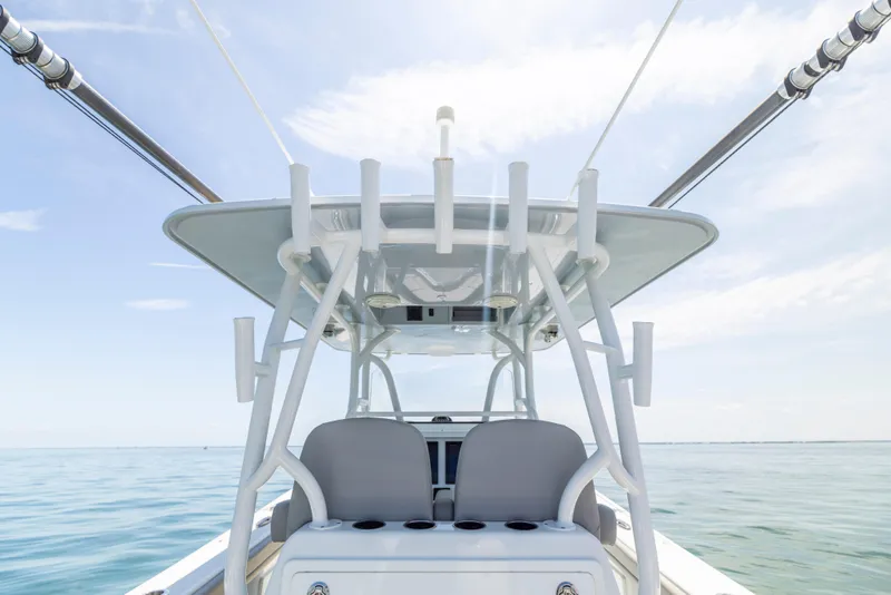 Slide: The Image of 2018 Yellowfin 32 Offshore boat on calm sea. - 28