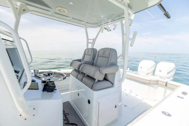 Slide: The Image of Interior of a 2018 Yellowfin 32 Offshore boat on the sea. - 30