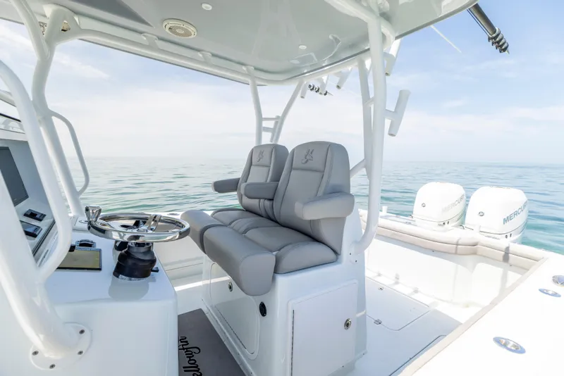 Slide: The Image of Interior of a 2018 Yellowfin 32 Offshore boat with gray seating. - 32