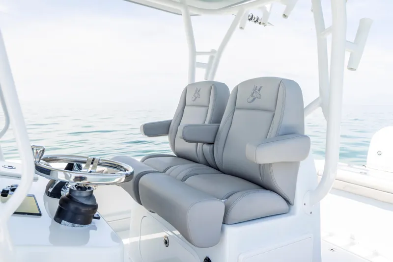 Slide: The Image of Interior of 2018 Yellowfin 32 Offshore boat with gray seats. - 33