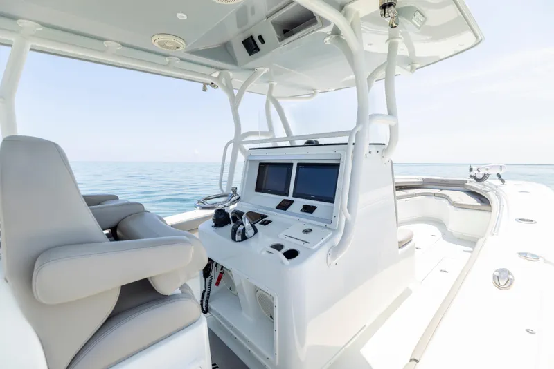 Slide: The Image of Interior view of a 2018 Yellowfin 32 Offshore boat on the sea. - 35