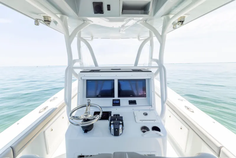 Slide: The Image of Interior view of a 2018 Yellowfin 32 Offshore boat on the water. - 38