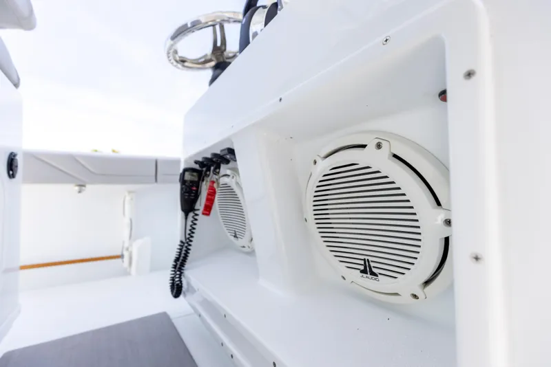Slide: The Image of Speakers and controls on a 2018 Yellowfin 32 Offshore boat. - 39