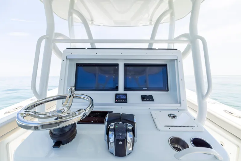 Slide: The Image of 2018 Yellowfin 32 Offshore boat helm with dual screens. - 40