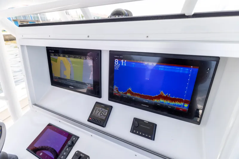 Slide: The Image of Navigation systems on a 2018 Yellowfin 32 Offshore boat. - 42