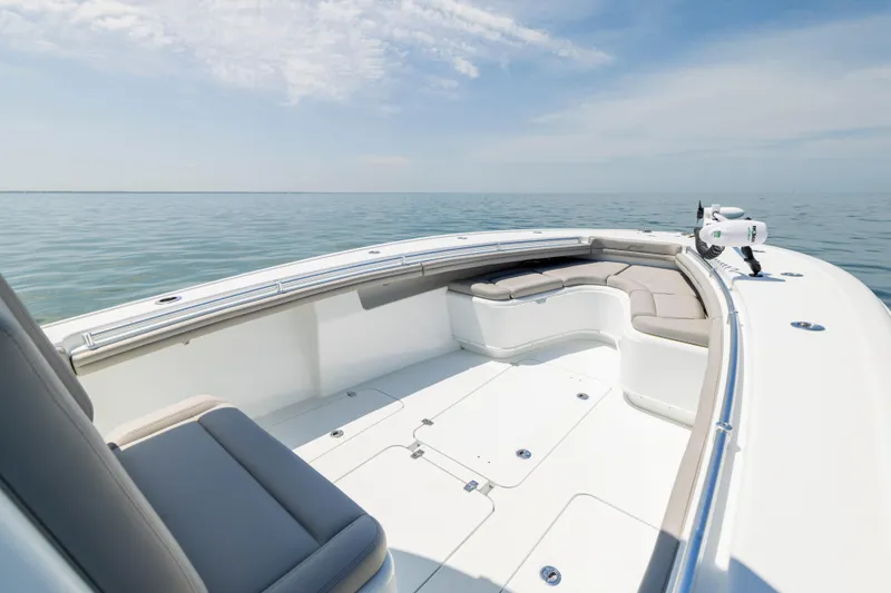 Slide: The Image of Interior view of a 2018 Yellowfin 32 Offshore boat on calm waters. - 43