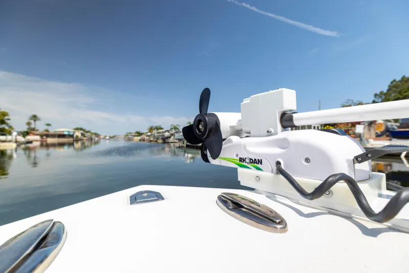 Slide: The Image of 2018 Yellowfin 32 Offshore boat on calm water with blue sky. - 48