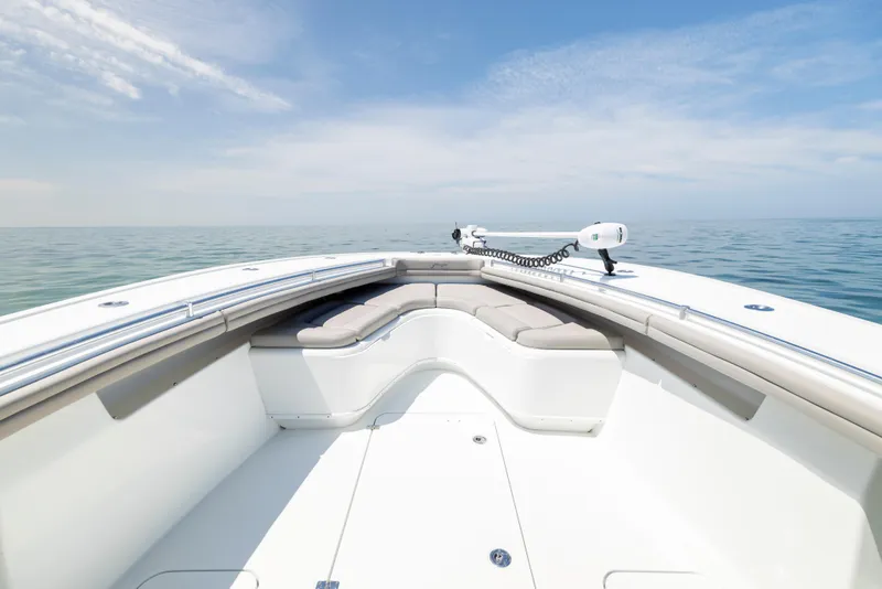 Slide: The Image of 2018 Yellowfin 32 Offshore boat on calm sea. - 49