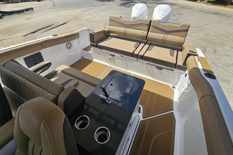 Slide: The Image of Luxurious interior of 2026 Monterey Elite 30 OB boat with stylish seating and modern design. - 10