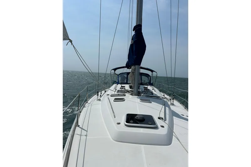 Slide: The Image of Sailing on a 2007 Beneteau Oceanis 46 yacht in open waters. - 13
