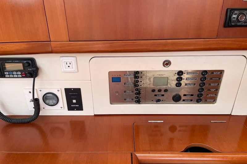 Slide: The Image of Control panel of a 2007 Beneteau Oceanis 46 yacht with navigation equipment. - 30