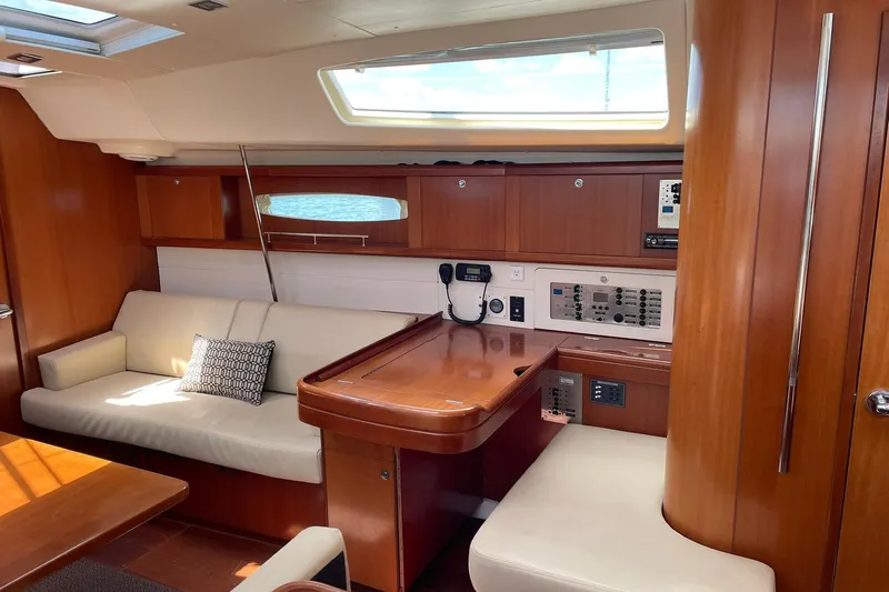 Slide: The Image of Interior of 2007 Beneteau Oceanis 46 yacht with wooden finish and comfortable seating. - 21