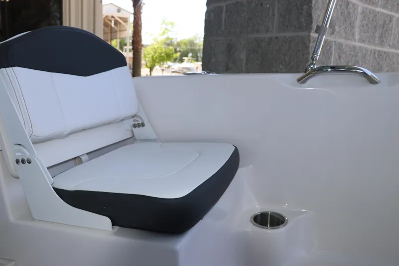 Slide: The Image of 2026 Robalo R160 Center Console boat seat with sleek white and black design. - 14