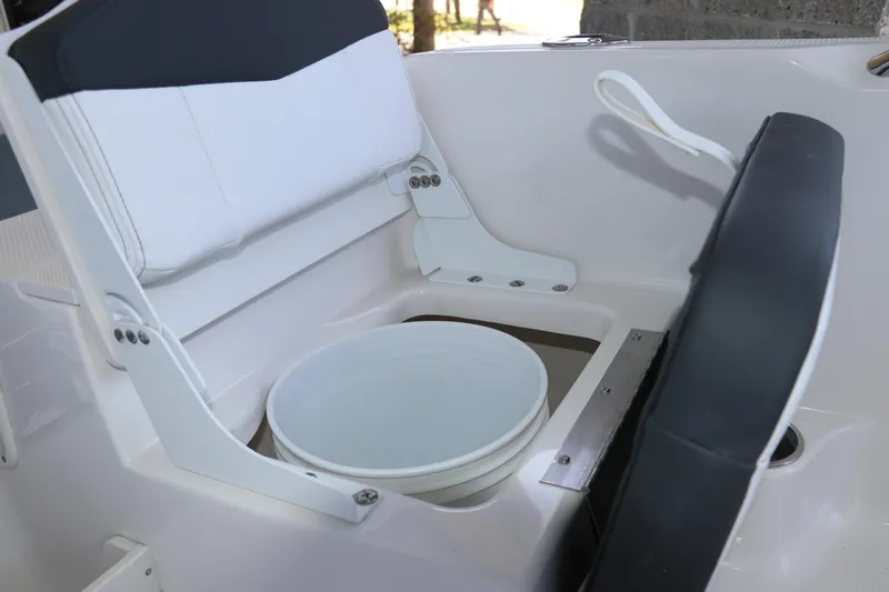 Slide: The Image of 2026 Robalo R160 Center Console boat seat with integrated storage compartment. - 15