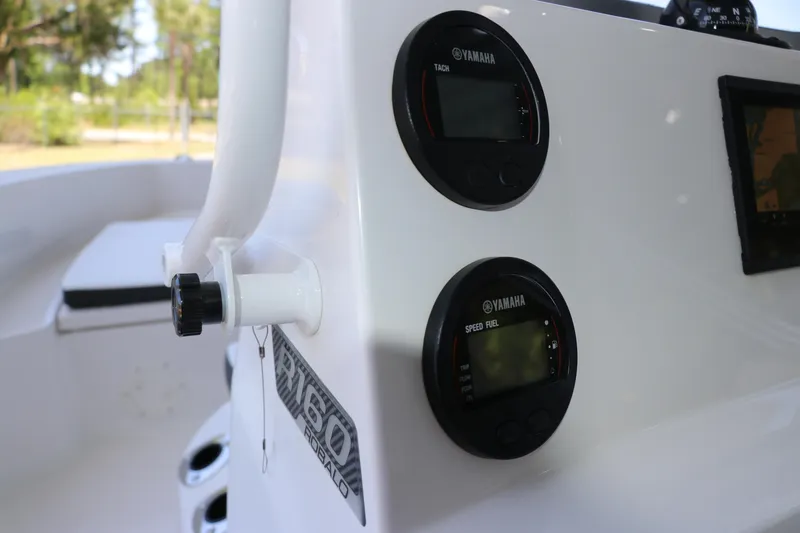 Slide: The Image of 2026 Robalo R160 Center Console dashboard with Yamaha gauges and controls. - 19