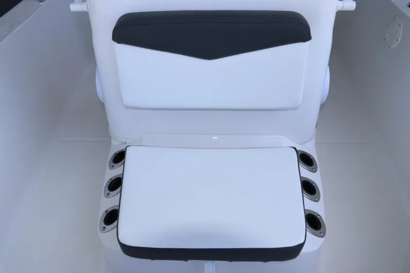 Slide: The Image of 2026 Robalo R160 Center Console boat seat with integrated cup holders. - 24
