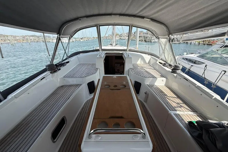 Slide: The Image of Cockpit view of 2018 Jeanneau 51 yacht, featuring spacious seating and elegant design. - 17
